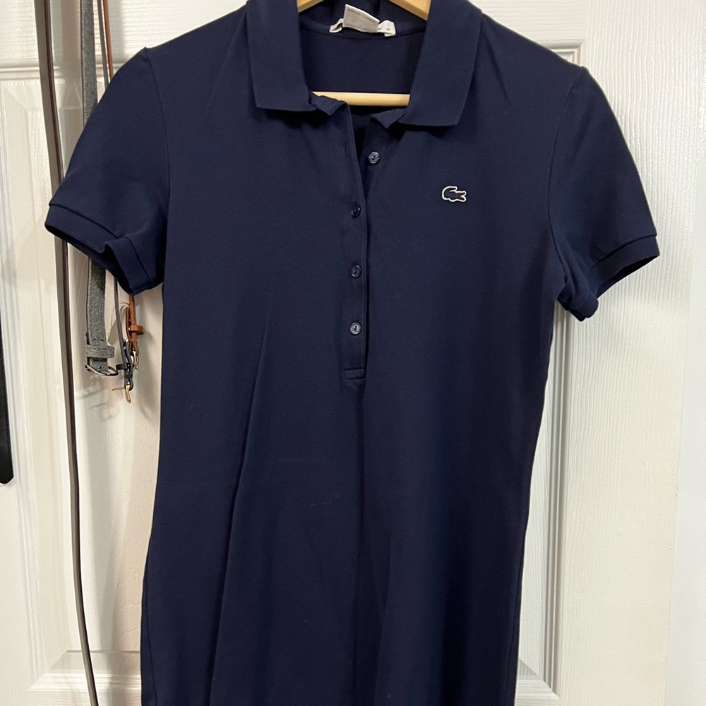 Navy blue polo dress from lacoste. Worn once. In very prestine condition